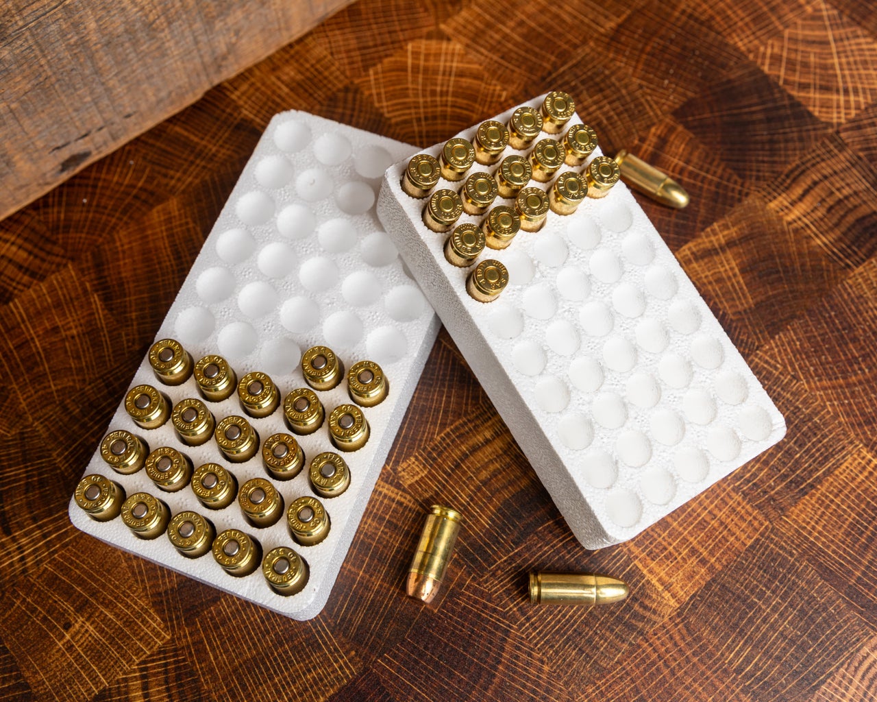 White molded foam ammunition trays filled with cartridges